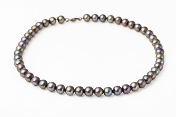 Collier perle pour homme : élégance et style unique
